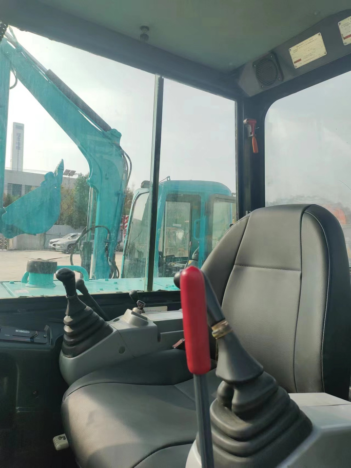KOBELCO SK60-8 - Mini bager: slika KOBELCO SK60-8 - Mini bager KOBELCO SK60-8 - Mini bager: slika KOBELCO SK60-8 - Mini bager