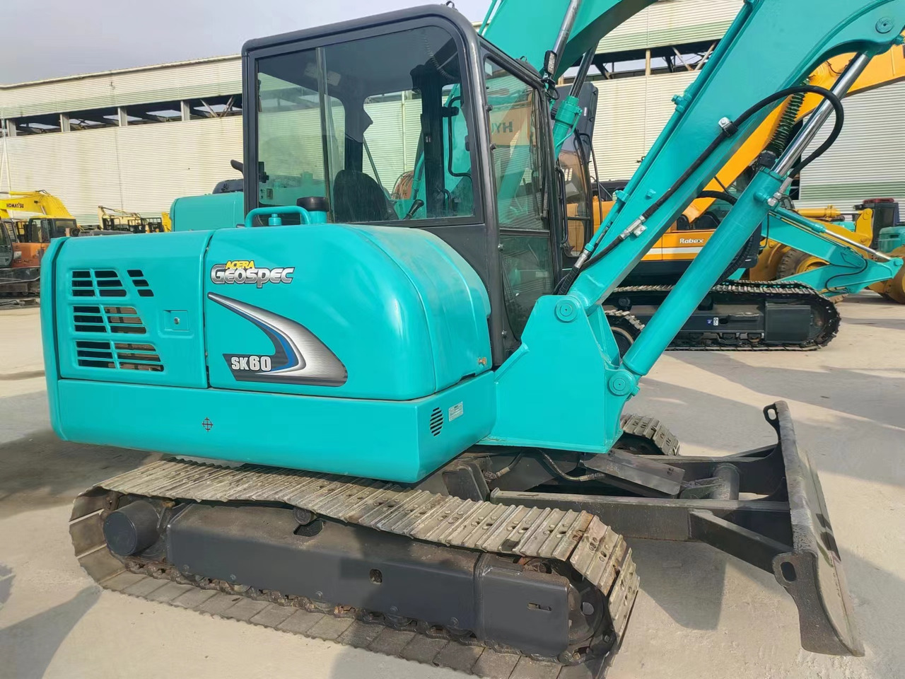 KOBELCO SK60-8 - Mini bager: slika KOBELCO SK60-8 - Mini bager KOBELCO SK60-8 - Mini bager: slika KOBELCO SK60-8 - Mini bager
