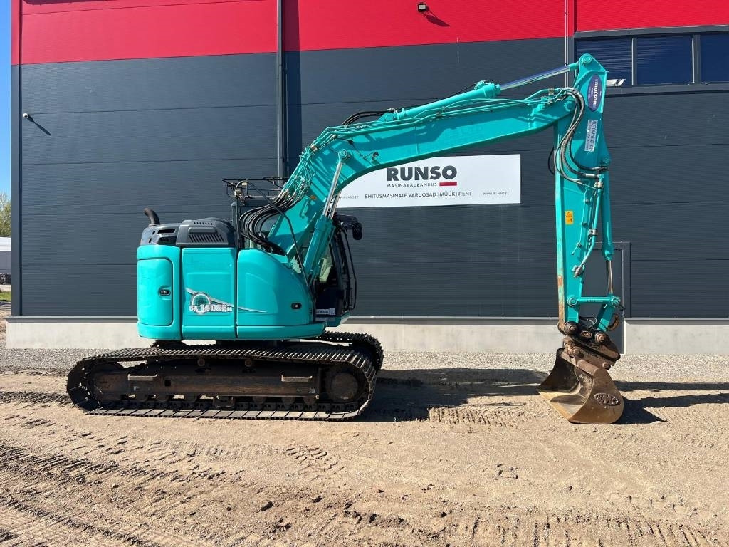 Kobelco SK 140 SRLC-5 - Bager gusjeničar: slika Kobelco SK 140 SRLC-5 - Bager gusjeničar Kobelco SK 140 SRLC-5 - Bager gusjeničar: slika Kobelco SK 140 SRLC-5 - Bager gusjeničar