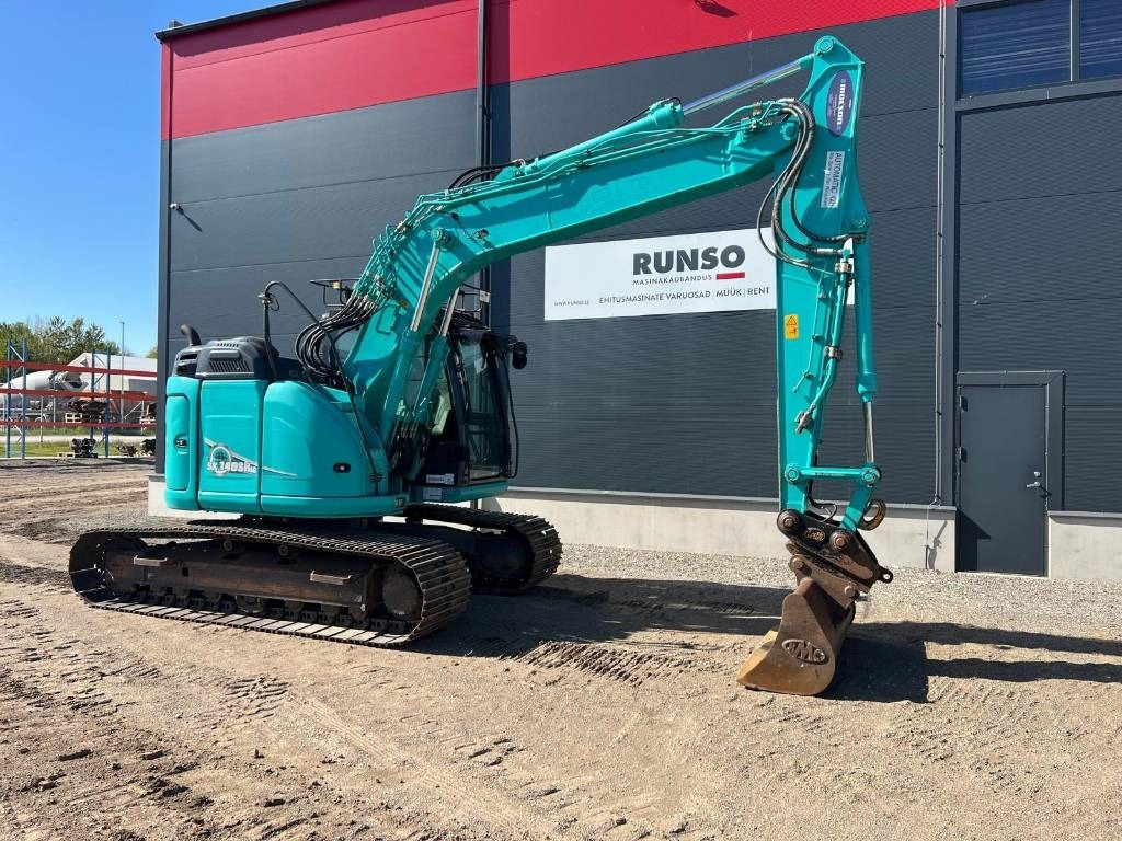Kobelco SK 140 SRLC-5 - Bager gusjeničar: slika Kobelco SK 140 SRLC-5 - Bager gusjeničar Kobelco SK 140 SRLC-5 - Bager gusjeničar: slika Kobelco SK 140 SRLC-5 - Bager gusjeničar