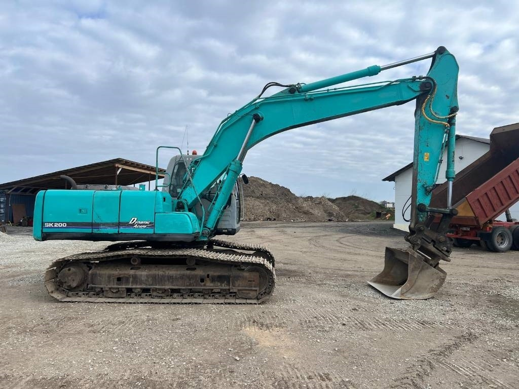 Kobelco SK 200-6 E - Bager gusjeničar: slika Kobelco SK 200-6 E - Bager gusjeničar Kobelco SK 200-6 E - Bager gusjeničar: slika Kobelco SK 200-6 E - Bager gusjeničar