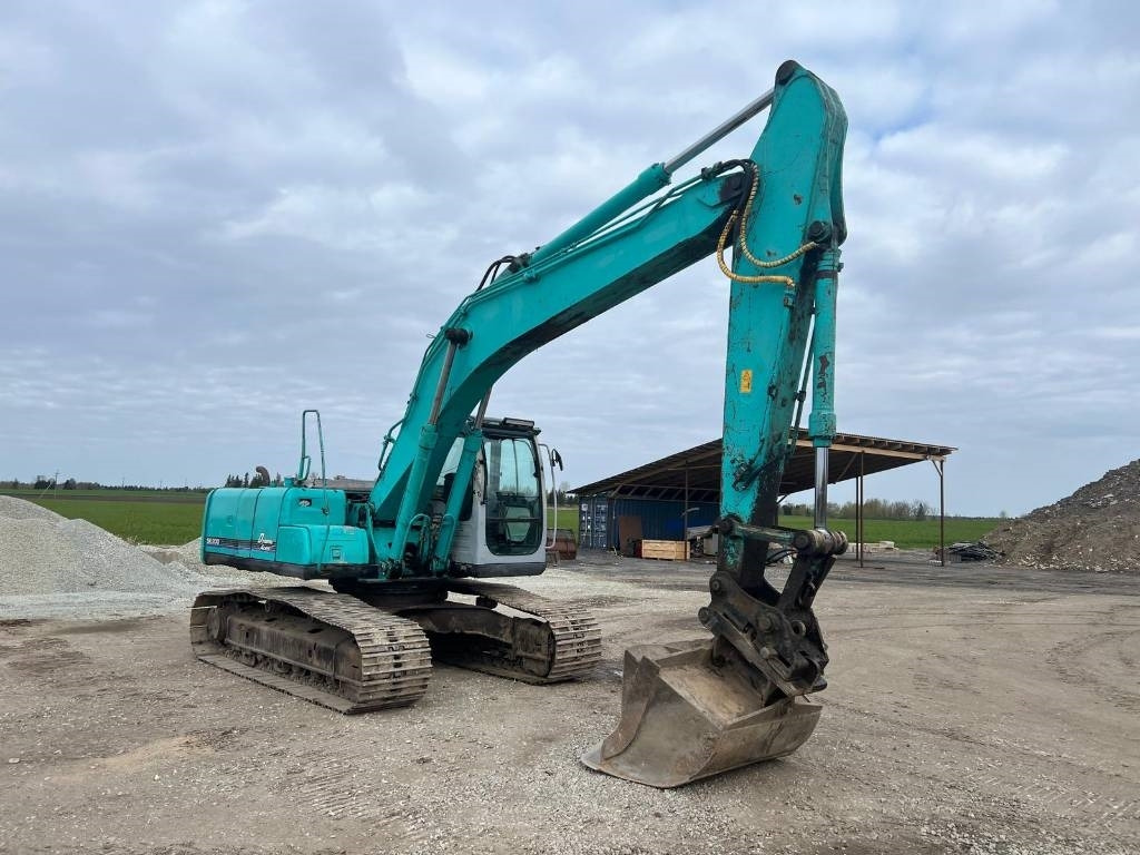 Kobelco SK 200-6 E - Bager gusjeničar: slika Kobelco SK 200-6 E - Bager gusjeničar Kobelco SK 200-6 E - Bager gusjeničar: slika Kobelco SK 200-6 E - Bager gusjeničar