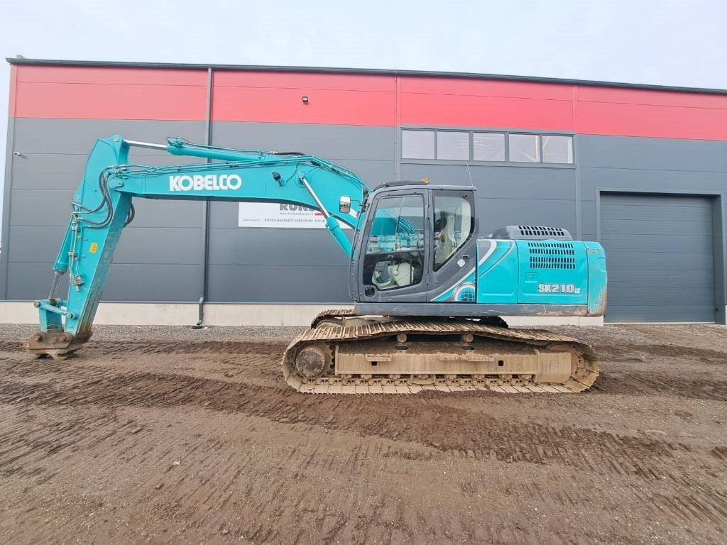 Kobelco SK 210-10 - Bager gusjeničar: slika Kobelco SK 210-10 - Bager gusjeničar Kobelco SK 210-10 - Bager gusjeničar: slika Kobelco SK 210-10 - Bager gusjeničar