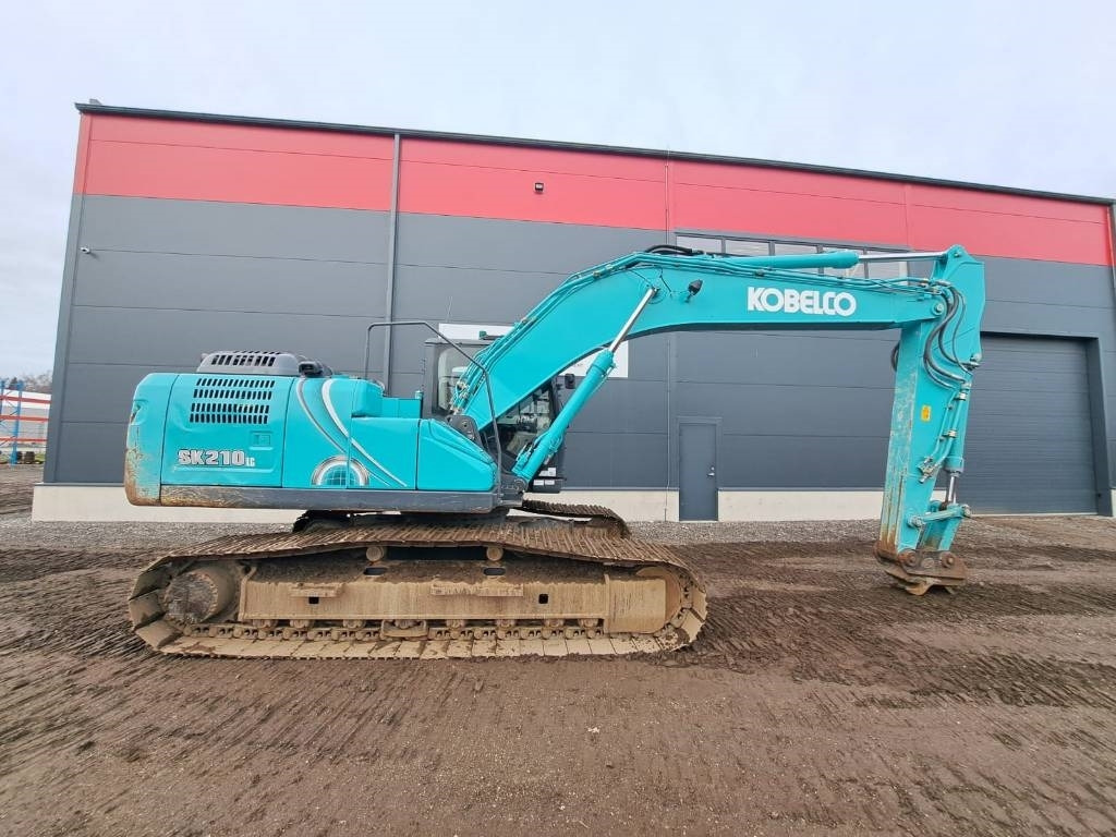 Kobelco SK 210-10 - Bager gusjeničar: slika Kobelco SK 210-10 - Bager gusjeničar Kobelco SK 210-10 - Bager gusjeničar: slika Kobelco SK 210-10 - Bager gusjeničar