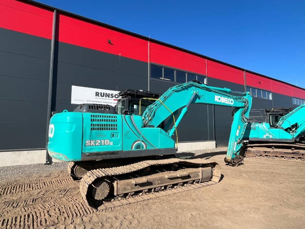 Kobelco SK 210 LC-10E - Bager gusjeničar: slika Kobelco SK 210 LC-10E - Bager gusjeničar Kobelco SK 210 LC-10E - Bager gusjeničar: slika Kobelco SK 210 LC-10E - Bager gusjeničar