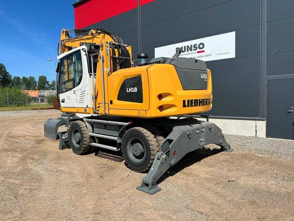 Liebherr LH 18 M Litronic - Stroj za rukovanje otpadom: slika Liebherr LH 18 M Litronic - Stroj za rukovanje otpadom Liebherr LH 18 M Litronic - Stroj za rukovanje otpadom: slika Liebherr LH 18 M Litronic - Stroj za rukovanje otpadom