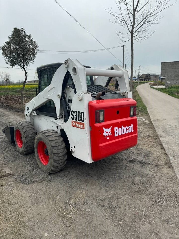 Bobcat S 300 - Mini utovarivač: slika Bobcat S 300 - Mini utovarivač Bobcat S 300 - Mini utovarivač: slika Bobcat S 300 - Mini utovarivač