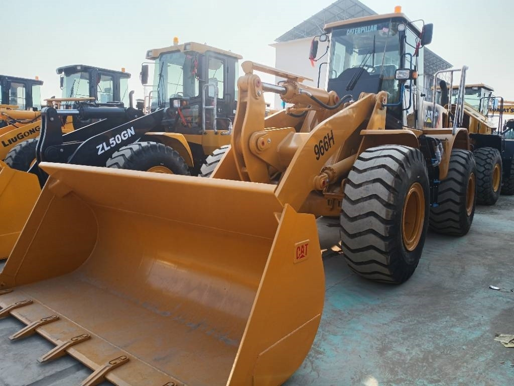 CAT 966 H - Utovarivač na kotačima: slika CAT 966 H - Utovarivač na kotačima CAT 966 H - Utovarivač na kotačima: slika CAT 966 H - Utovarivač na kotačima