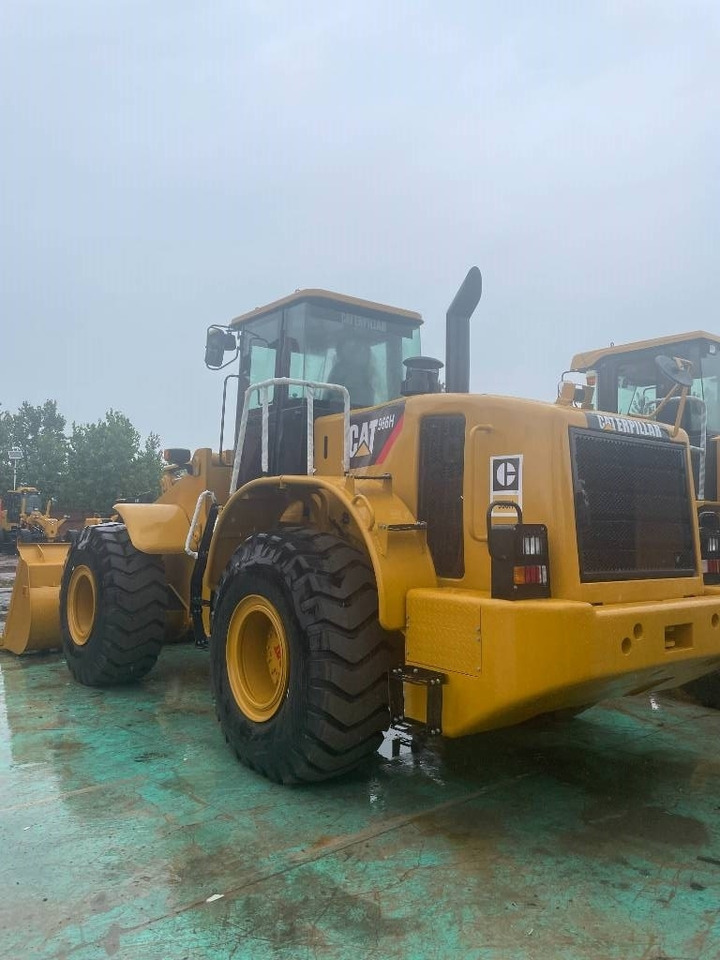 CAT 966 H - Utovarivač na kotačima: slika CAT 966 H - Utovarivač na kotačima CAT 966 H - Utovarivač na kotačima: slika CAT 966 H - Utovarivač na kotačima