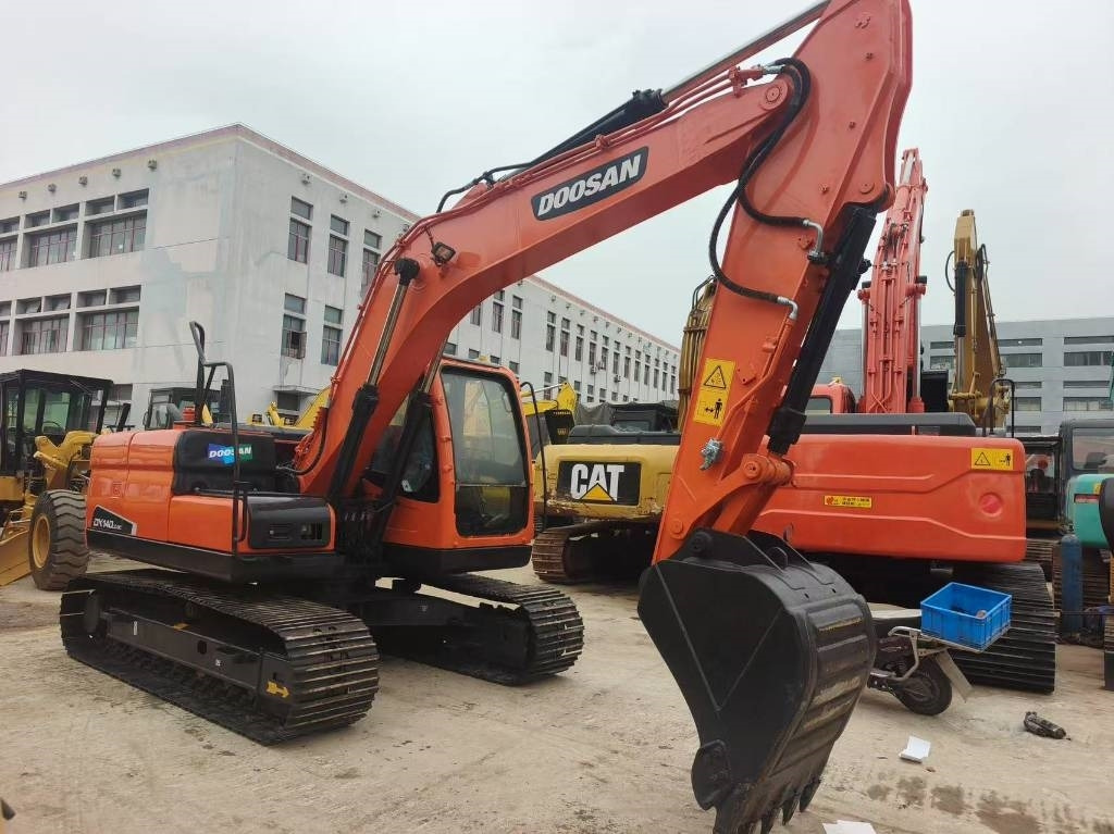 Doosan DX 140 - Bager gusjeničar: slika Doosan DX 140 - Bager gusjeničar Doosan DX 140 - Bager gusjeničar: slika Doosan DX 140 - Bager gusjeničar