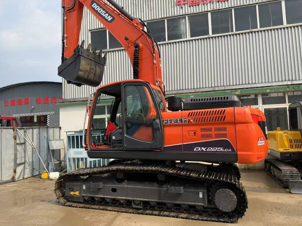 Doosan DX 225 LCA - Bager gusjeničar: slika Doosan DX 225 LCA - Bager gusjeničar Doosan DX 225 LCA - Bager gusjeničar: slika Doosan DX 225 LCA - Bager gusjeničar