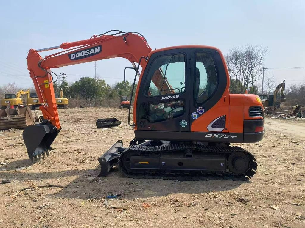 Doosan DX 75-9 C - Mini bager: slika Doosan DX 75-9 C - Mini bager Doosan DX 75-9 C - Mini bager: slika Doosan DX 75-9 C - Mini bager