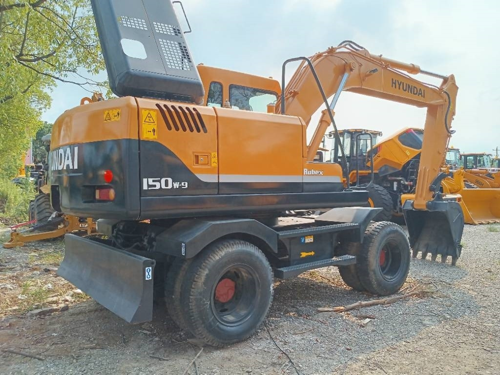 Hyundai R150W - Bager na kotačima: slika Hyundai R150W - Bager na kotačima Hyundai R150W - Bager na kotačima: slika Hyundai R150W - Bager na kotačima