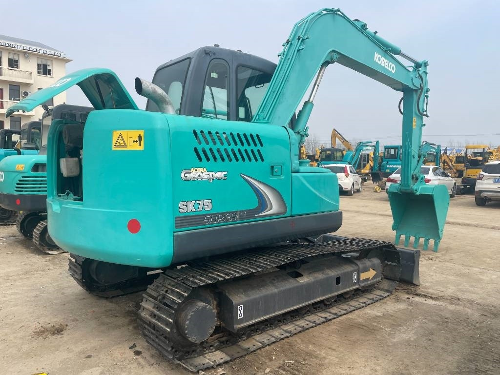 Kobelco SK 75 - Mini bager: slika Kobelco SK 75 - Mini bager Kobelco SK 75 - Mini bager: slika Kobelco SK 75 - Mini bager