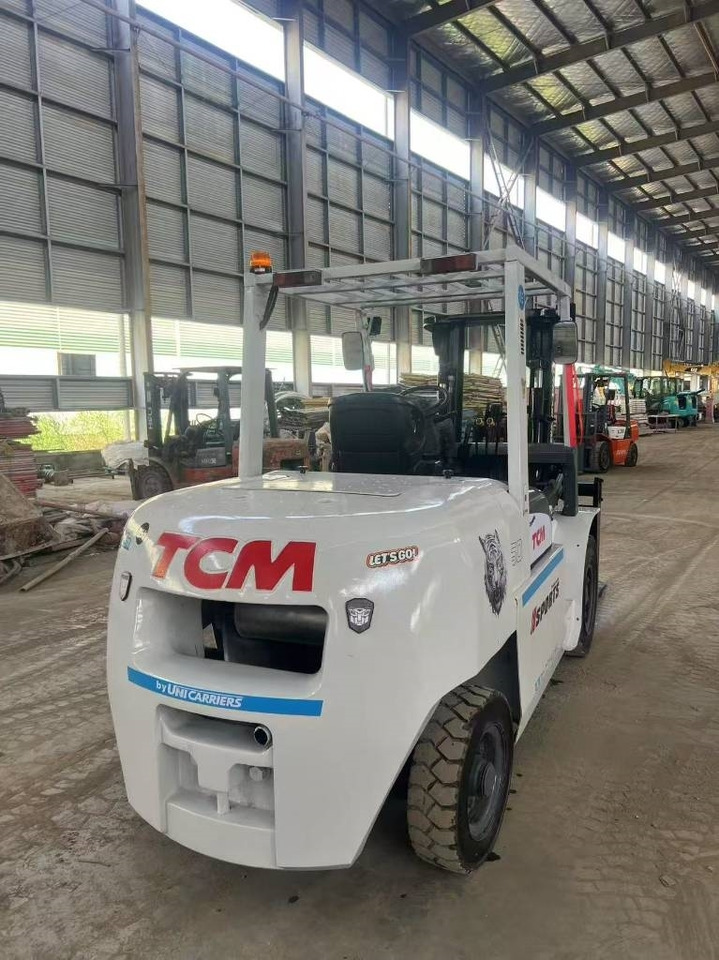 TCM FD 50 - Diesel viličar: slika TCM FD 50 - Diesel viličar TCM FD 50 - Diesel viličar: slika TCM FD 50 - Diesel viličar