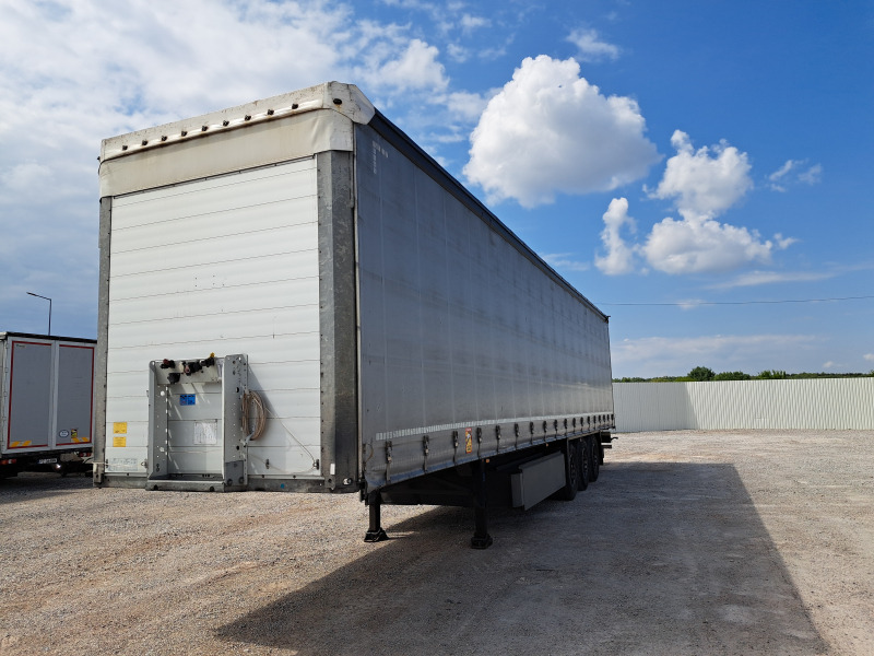 SCHMITZ CARGOBULL SCBS3T KURTYNOWA - Prikolica s ceradom: slika SCHMITZ CARGOBULL SCBS3T KURTYNOWA - Prikolica s ceradom SCHMITZ CARGOBULL SCBS3T KURTYNOWA - Prikolica s ceradom: slika SCHMITZ CARGOBULL SCBS3T KURTYNOWA - Prikolica s ceradom