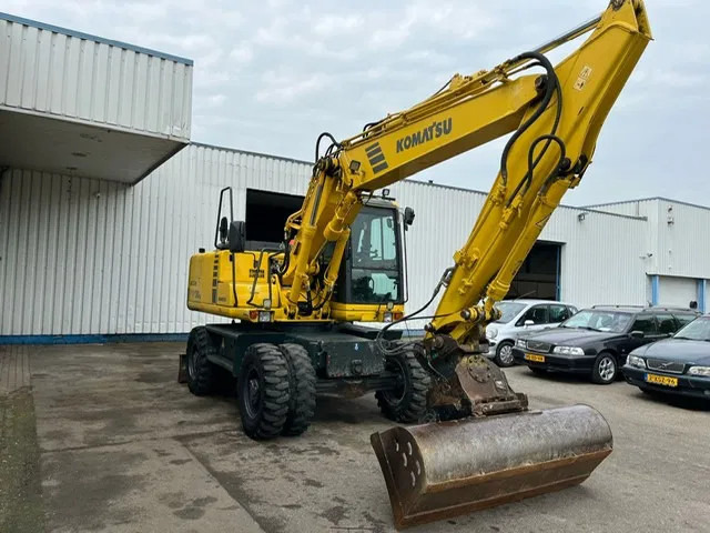 Komatsu PW 130 ES-6K , Wheel Excavator - Bager na kotačima: slika Komatsu PW 130 ES-6K , Wheel Excavator - Bager na kotačima Komatsu PW 130 ES-6K , Wheel Excavator - Bager na kotačima: slika Komatsu PW 130 ES-6K , Wheel Excavator - Bager na kotačima