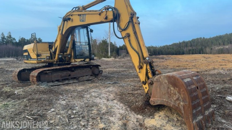1994 Cat 312 gravemaskin med tannskuffe og pusseskuffe - Bager: slika 1994 Cat 312 gravemaskin med tannskuffe og pusseskuffe - Bager 1994 Cat 312 gravemaskin med tannskuffe og pusseskuffe - Bager: slika 1994 Cat 312 gravemaskin med tannskuffe og pusseskuffe - Bager