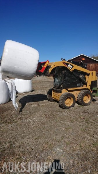 Mini utovarivač 2002 Cat 216 kompaktlaster med motorvarmer: slika Mini utovarivač 2002 Cat 216 kompaktlaster med motorvarmer