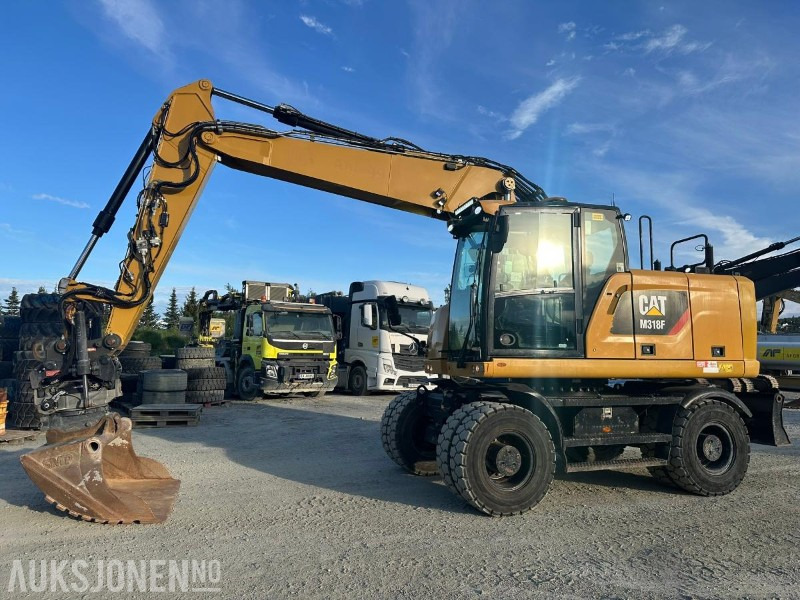 2019 Cat M318F hjulgraver med tiltrotator og skuff - Bager: slika 2019 Cat M318F hjulgraver med tiltrotator og skuff - Bager 2019 Cat M318F hjulgraver med tiltrotator og skuff - Bager: slika 2019 Cat M318F hjulgraver med tiltrotator og skuff - Bager