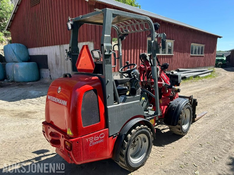 Weidemann 1260 CLASSIC HJULLASTER-PALLEGAFFEL-SKUFFE - Utovarivač na kotačima: slika Weidemann 1260 CLASSIC HJULLASTER-PALLEGAFFEL-SKUFFE - Utovarivač na kotačima Weidemann 1260 CLASSIC HJULLASTER-PALLEGAFFEL-SKUFFE - Utovarivač na kotačima: slika Weidemann 1260 CLASSIC HJULLASTER-PALLEGAFFEL-SKUFFE - Utovarivač na kotačima