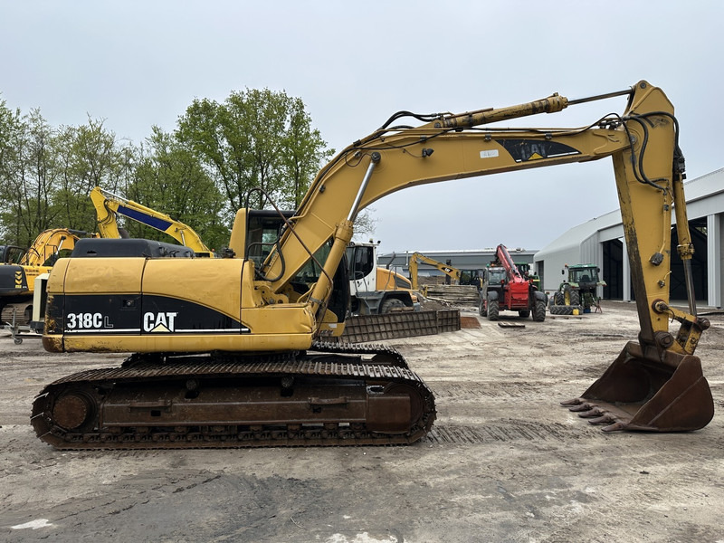 Caterpillar 318 CL (not 320CL - 325CL) - Bager gusjeničar: slika Caterpillar 318 CL (not 320CL - 325CL) - Bager gusjeničar Caterpillar 318 CL (not 320CL - 325CL) - Bager gusjeničar: slika Caterpillar 318 CL (not 320CL - 325CL) - Bager gusjeničar