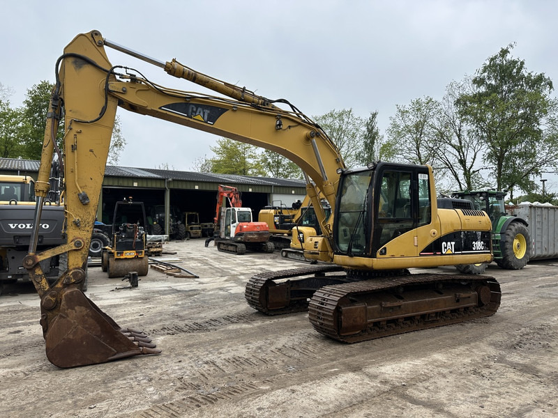 Caterpillar 318 CL (not 320CL - 325CL) - Bager gusjeničar: slika Caterpillar 318 CL (not 320CL - 325CL) - Bager gusjeničar Caterpillar 318 CL (not 320CL - 325CL) - Bager gusjeničar: slika Caterpillar 318 CL (not 320CL - 325CL) - Bager gusjeničar