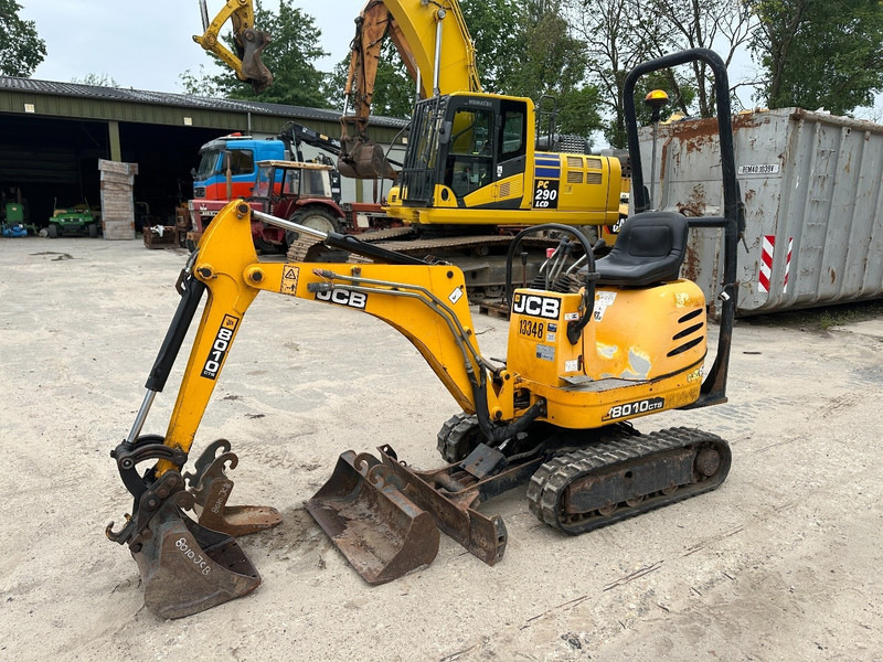 JCB 8010 CTS 3 buckets - extendable undercarriage - Bager gusjeničar: slika JCB 8010 CTS 3 buckets - extendable undercarriage - Bager gusjeničar JCB 8010 CTS 3 buckets - extendable undercarriage - Bager gusjeničar: slika JCB 8010 CTS 3 buckets - extendable undercarriage - Bager gusjeničar