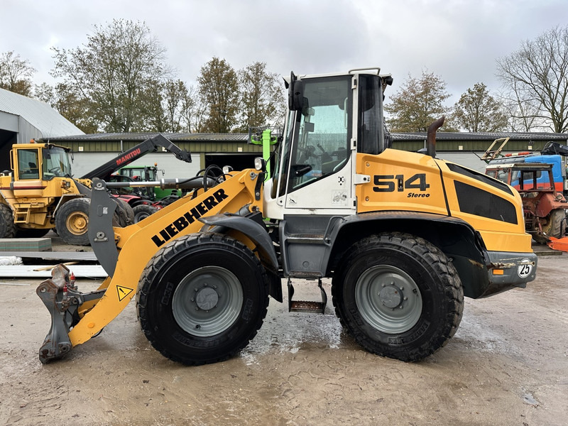 Liebherr L514 - Utovarivač: slika Liebherr L514 - Utovarivač Liebherr L514 - Utovarivač: slika Liebherr L514 - Utovarivač