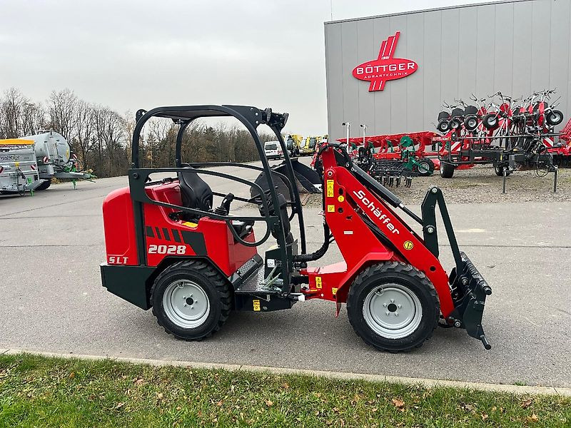 Schäffer 2028 SLT - Zglobni utovarivač: slika Schäffer 2028 SLT - Zglobni utovarivač Schäffer 2028 SLT - Zglobni utovarivač: slika Schäffer 2028 SLT - Zglobni utovarivač