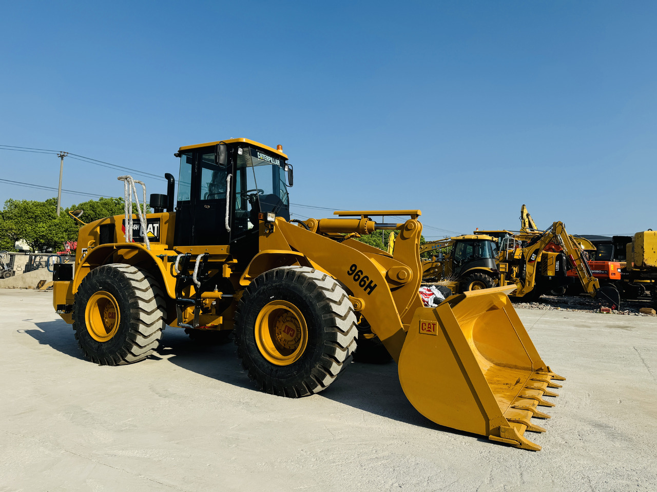 Utovarivač na kotačima Caterpillar 966 Wheel Used Loader CAT 966H 966F 966G Loaders in Great Quality for Sale: slika Utovarivač na kotačima Caterpillar 966 Wheel Used Loader CAT 966H 966F 966G Loaders in Great Quality for Sale Utovarivač na kotačima Caterpillar 966 Wheel Used Loader CAT 966H 966F 966G Loaders in Great Quality for Sale: slika Utovarivač na kotačima Caterpillar 966 Wheel Used Loader CAT 966H 966F 966G Loaders in Great Quality for Sale