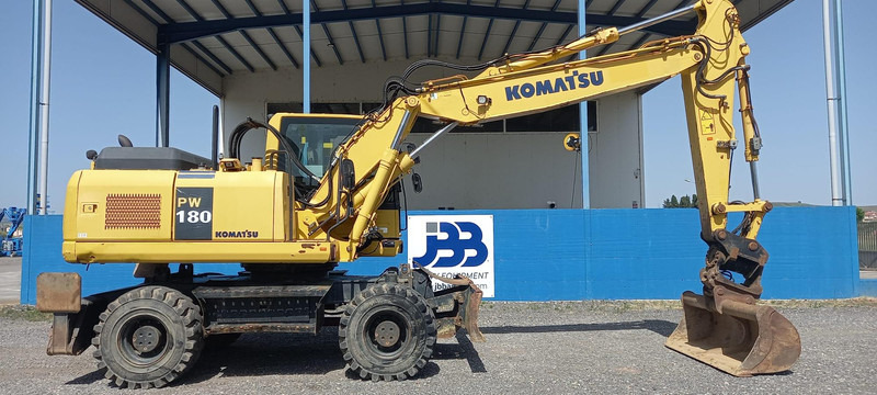 Komatsu PW180-7EO - Bager na kotačima: slika Komatsu PW180-7EO - Bager na kotačima Komatsu PW180-7EO - Bager na kotačima: slika Komatsu PW180-7EO - Bager na kotačima