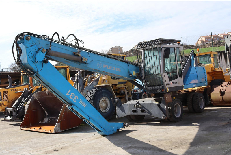 Terex Fuchs MHL331 - Bager na kotačima: slika Terex Fuchs MHL331 - Bager na kotačima Terex Fuchs MHL331 - Bager na kotačima: slika Terex Fuchs MHL331 - Bager na kotačima