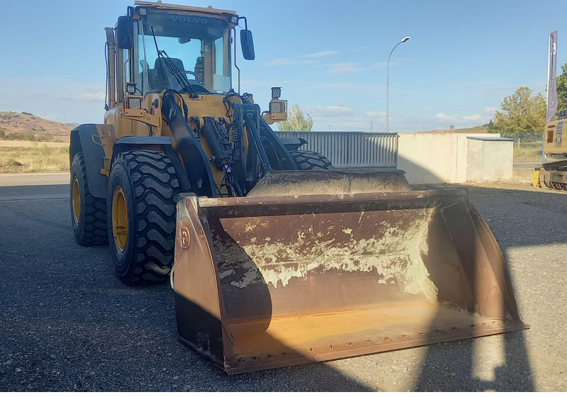 Volvo L70E - Utovarivač na kotačima: slika Volvo L70E - Utovarivač na kotačima Volvo L70E - Utovarivač na kotačima: slika Volvo L70E - Utovarivač na kotačima