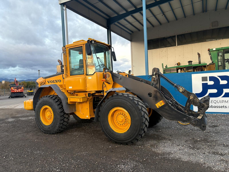 Volvo L70E - Utovarivač na kotačima: slika Volvo L70E - Utovarivač na kotačima Volvo L70E - Utovarivač na kotačima: slika Volvo L70E - Utovarivač na kotačima