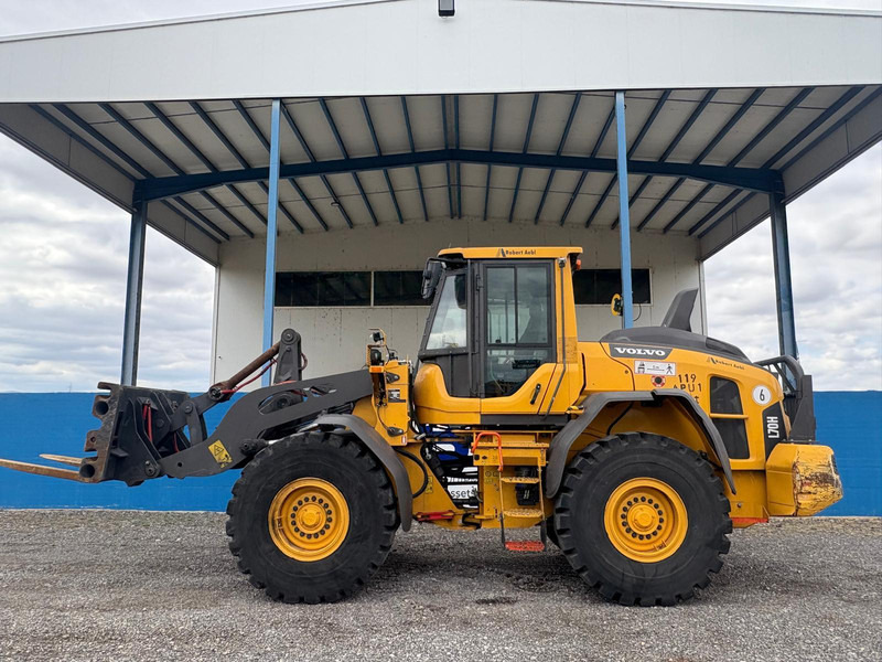 Volvo L70H - Utovarivač na kotačima: slika Volvo L70H - Utovarivač na kotačima Volvo L70H - Utovarivač na kotačima: slika Volvo L70H - Utovarivač na kotačima