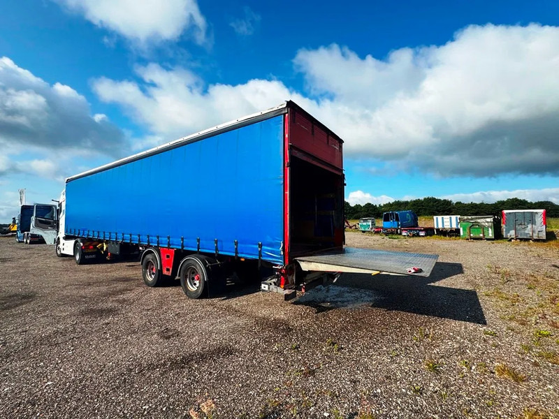 DANSON City Trailer Gardin with lift - Poluprikolica za prijevoz automobila: slika DANSON City Trailer Gardin with lift - Poluprikolica za prijevoz automobila DANSON City Trailer Gardin with lift - Poluprikolica za prijevoz automobila: slika DANSON City Trailer Gardin with lift - Poluprikolica za prijevoz automobila