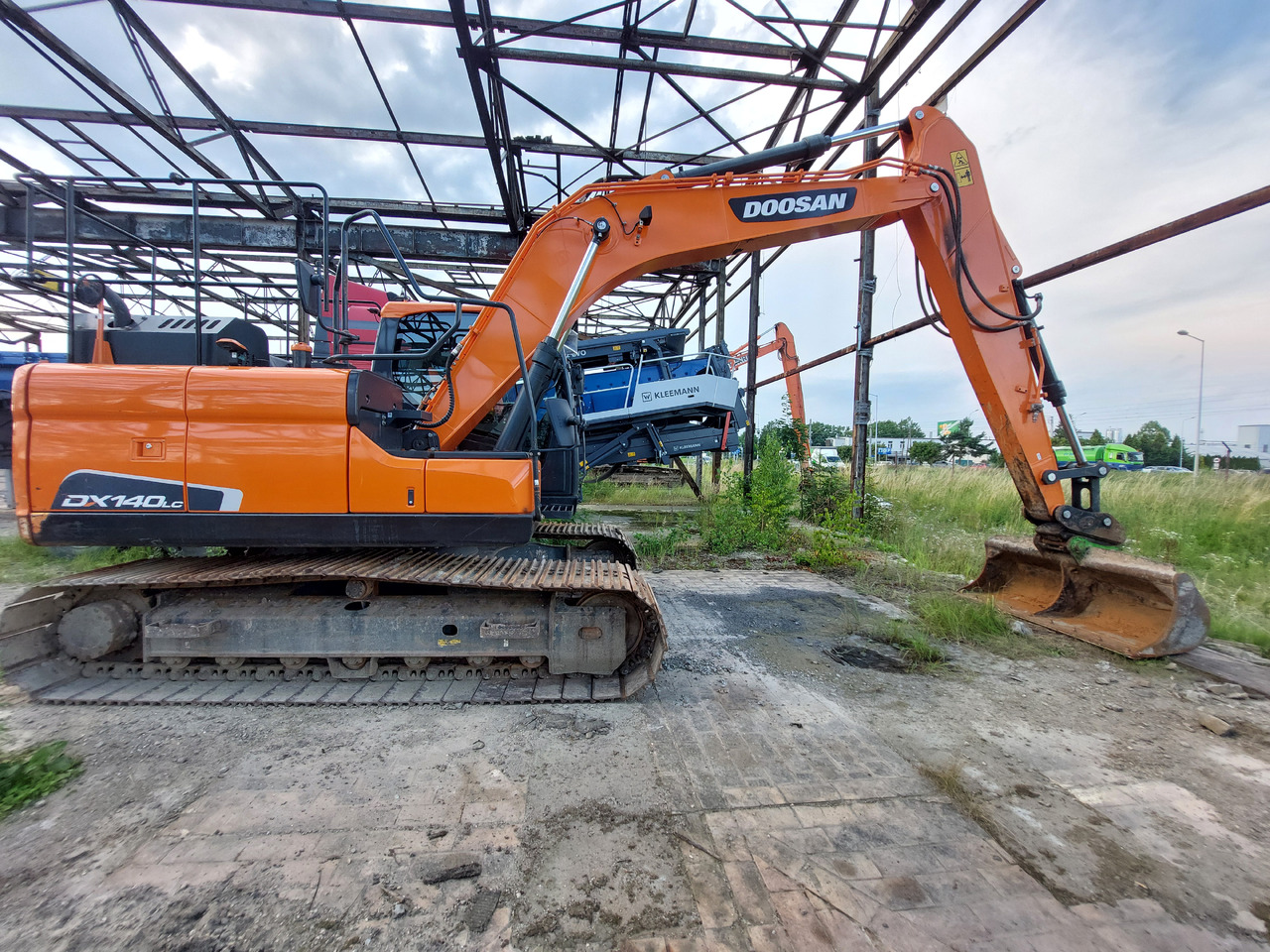 DOOSAN DX140LC-5 - Bager gusjeničar: slika DOOSAN DX140LC-5 - Bager gusjeničar DOOSAN DX140LC-5 - Bager gusjeničar: slika DOOSAN DX140LC-5 - Bager gusjeničar