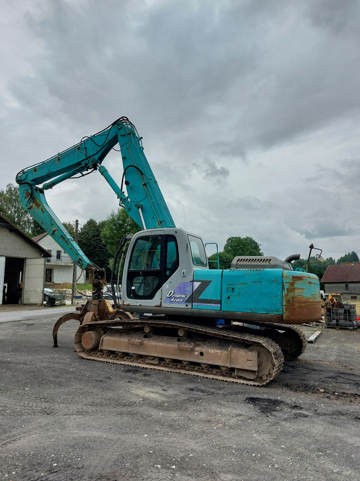 KOBELCO SK220 - Stroj za rukovanje otpadom: slika KOBELCO SK220 - Stroj za rukovanje otpadom KOBELCO SK220 - Stroj za rukovanje otpadom: slika KOBELCO SK220 - Stroj za rukovanje otpadom