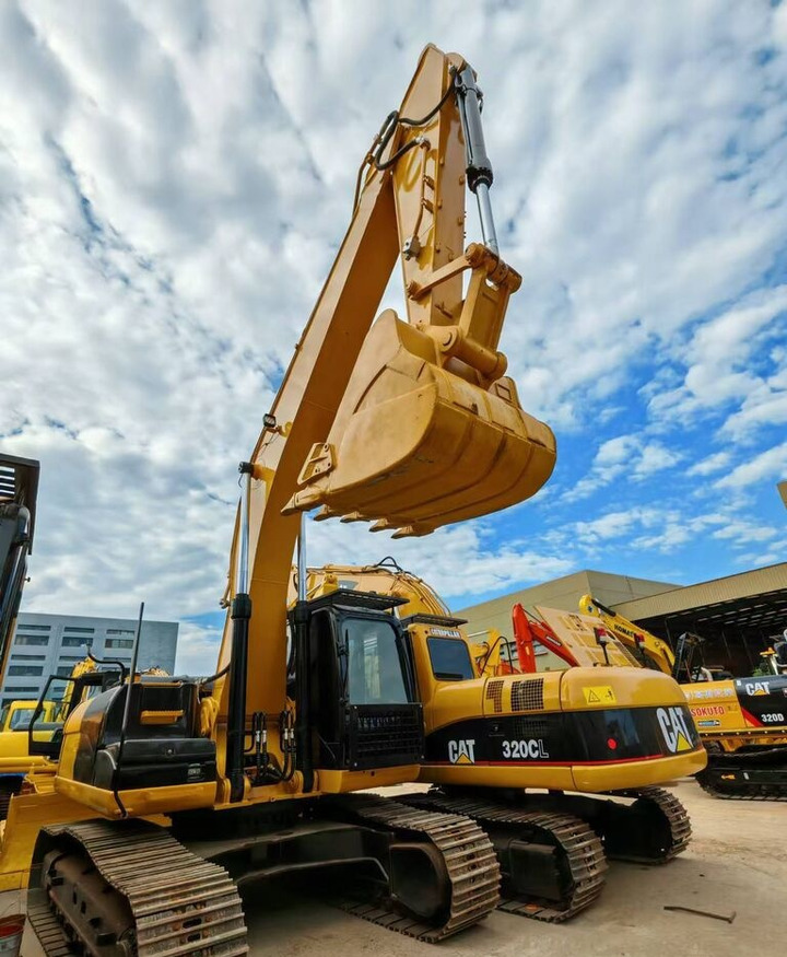 Caterpillar 320CL - Bager na kotačima: slika Caterpillar 320CL - Bager na kotačima Caterpillar 320CL - Bager na kotačima: slika Caterpillar 320CL - Bager na kotačima