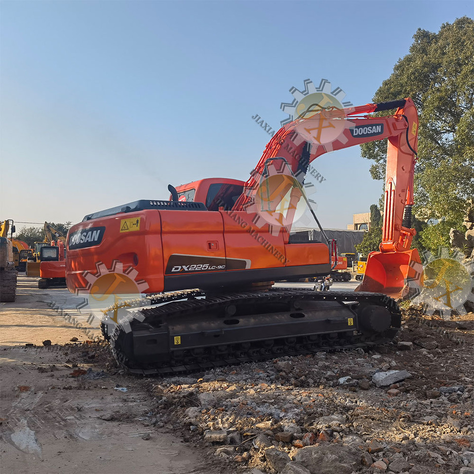 DOOSAN Doosan DX225LC Crawler excavator - Bager gusjeničar: slika DOOSAN Doosan DX225LC Crawler excavator - Bager gusjeničar DOOSAN Doosan DX225LC Crawler excavator - Bager gusjeničar: slika DOOSAN Doosan DX225LC Crawler excavator - Bager gusjeničar