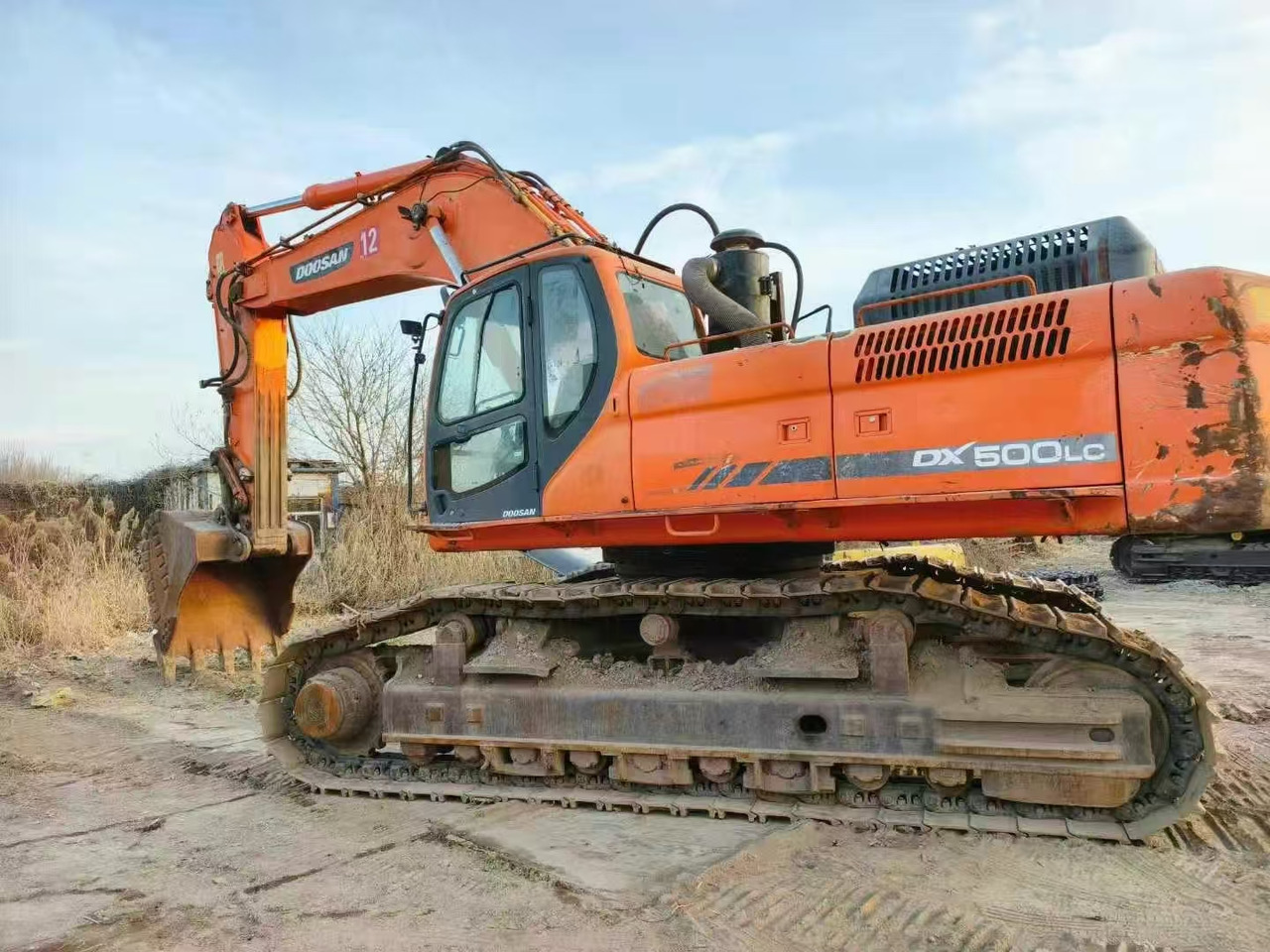 DOOSAN Doosan DX500LC Crawler excavator - Bager gusjeničar: slika DOOSAN Doosan DX500LC Crawler excavator - Bager gusjeničar DOOSAN Doosan DX500LC Crawler excavator - Bager gusjeničar: slika DOOSAN Doosan DX500LC Crawler excavator - Bager gusjeničar