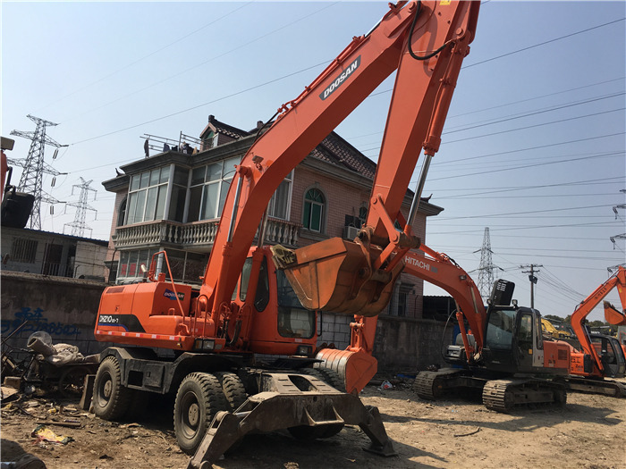 Doosan DH210w-7 wheel excavator - Bager na kotačima: slika Doosan DH210w-7 wheel excavator - Bager na kotačima Doosan DH210w-7 wheel excavator - Bager na kotačima: slika Doosan DH210w-7 wheel excavator - Bager na kotačima