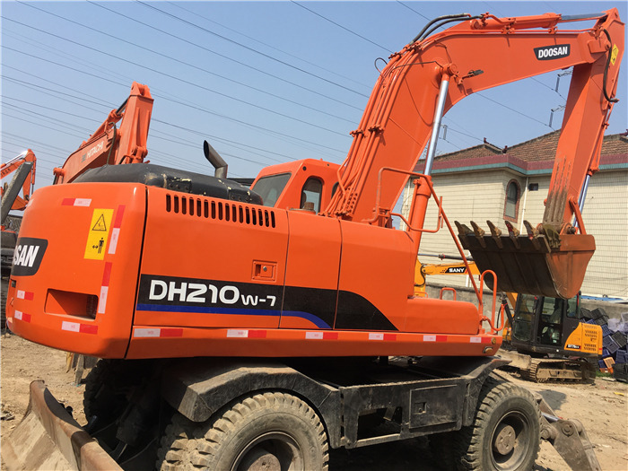 Doosan DH210w-7 wheel excavator - Bager na kotačima: slika Doosan DH210w-7 wheel excavator - Bager na kotačima Doosan DH210w-7 wheel excavator - Bager na kotačima: slika Doosan DH210w-7 wheel excavator - Bager na kotačima