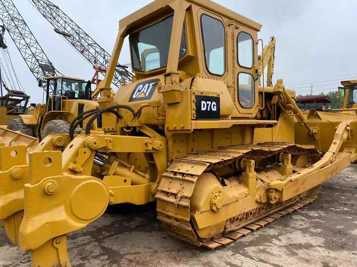 High Performance and Excellent Condition Used CAT D7G Crawler Bulldozer Original Caterpillar for sale in stock - Buldožer: slika High Performance and Excellent Condition Used CAT D7G Crawler Bulldozer Original Caterpillar for sale in stock - Buldožer High Performance and Excellent Condition Used CAT D7G Crawler Bulldozer Original Caterpillar for sale in stock - Buldožer: slika High Performance and Excellent Condition Used CAT D7G Crawler Bulldozer Original Caterpillar for sale in stock - Buldožer