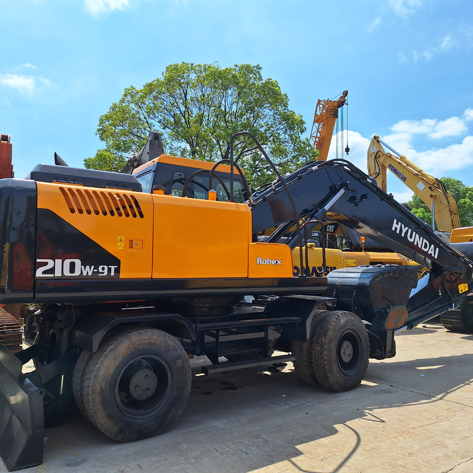 Hyundai 210w-9 wheel excavator - Bager na kotačima: slika Hyundai 210w-9 wheel excavator - Bager na kotačima Hyundai 210w-9 wheel excavator - Bager na kotačima: slika Hyundai 210w-9 wheel excavator - Bager na kotačima