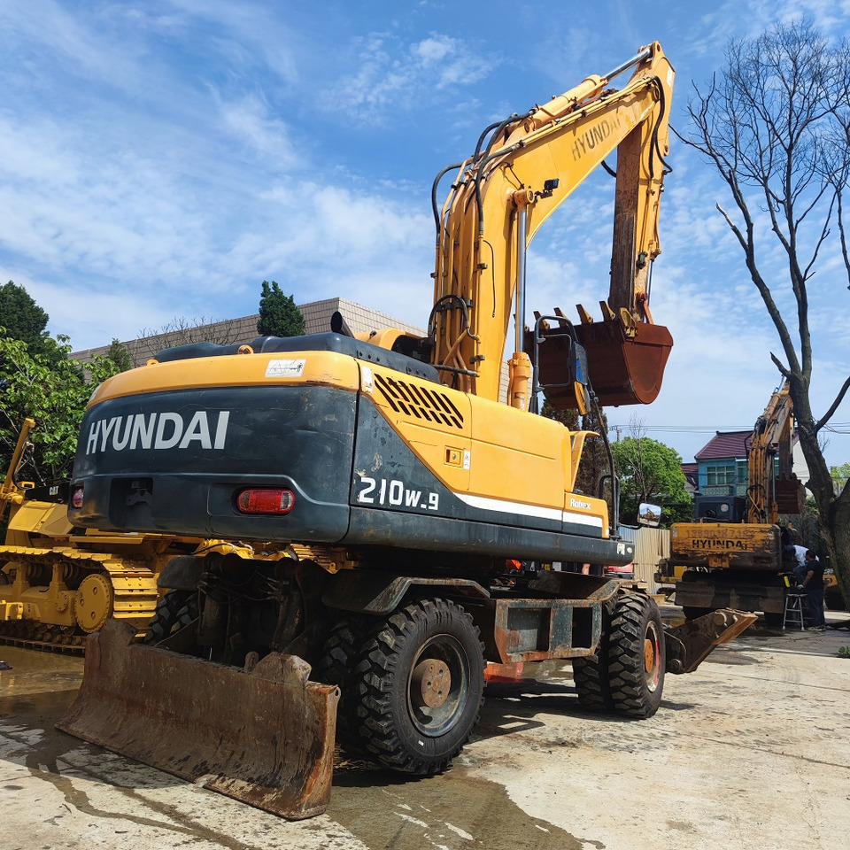 Hyundai 210w-9 wheel excavator - Bager na kotačima: slika Hyundai 210w-9 wheel excavator - Bager na kotačima Hyundai 210w-9 wheel excavator - Bager na kotačima: slika Hyundai 210w-9 wheel excavator - Bager na kotačima