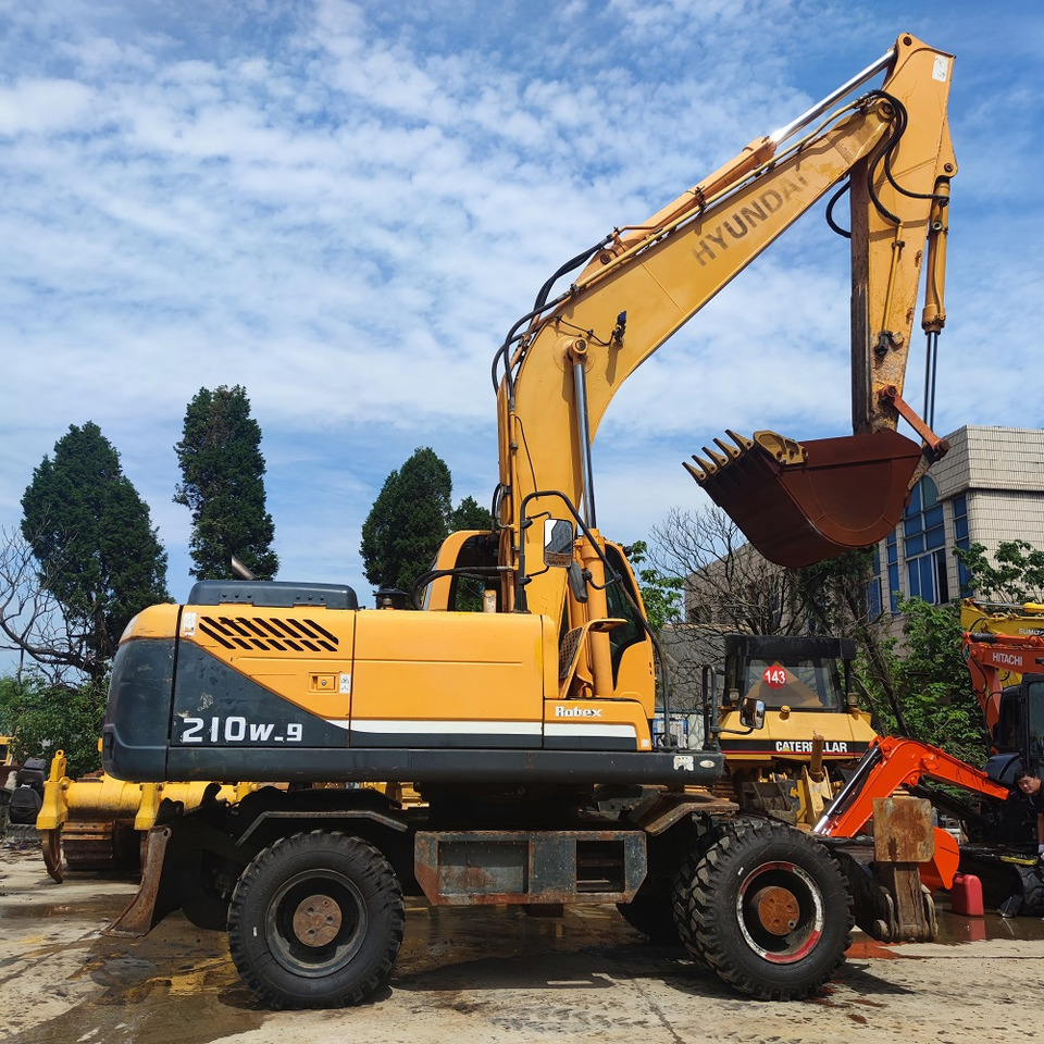 Hyundai 210w-9 wheel excavator - Bager na kotačima: slika Hyundai 210w-9 wheel excavator - Bager na kotačima Hyundai 210w-9 wheel excavator - Bager na kotačima: slika Hyundai 210w-9 wheel excavator - Bager na kotačima
