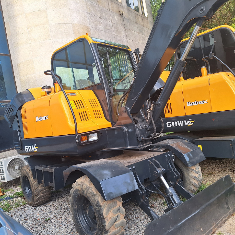 Hyundai 60vs  excavator - Bager na kotačima: slika  Hyundai 60vs  excavator - Bager na kotačima Hyundai 60vs  excavator - Bager na kotačima: slika  Hyundai 60vs  excavator - Bager na kotačima