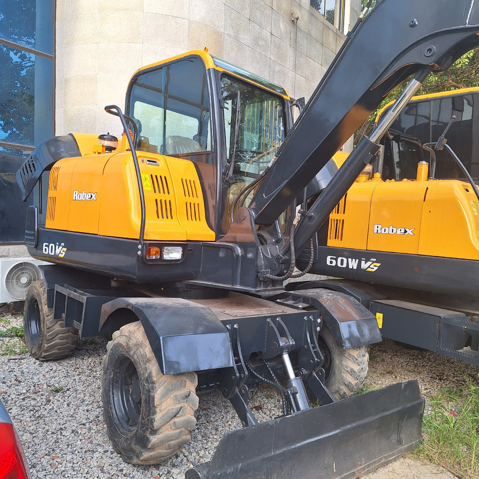 Hyundai 60vs  excavator - Bager na kotačima: slika  Hyundai 60vs  excavator - Bager na kotačima Hyundai 60vs  excavator - Bager na kotačima: slika  Hyundai 60vs  excavator - Bager na kotačima